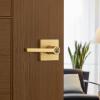 imageKwikset Halifax Entry Door Handle with Lock and Key Secure Keyed Reversible Lever Exterior For Front Entrance and Bedrooms Matte Black Pick Resistant Smartkey Rekey Security and MicrobanSatin Brass