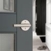 imageKwikset Milan Interior Privacy Door Handle with Lock Door Lever For Bathroom and Bedroom Matte Black Reversible Keyless Push Button Lock Door LeverSatin Nickel