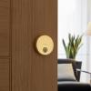 imageKwikset Uptown Deadbolt Lock Satin Brass Round Exterior Keyed Front Entry Door Pick Resistant SmartKey Rekey Security Single Cylinder Dead Bolt with Microban ProtectionSatin Brass