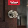 imageKwikset Juno Entry Door Knob with Lock and Key Secure Keyed Handle Exterior Front Entrance and Bedroom Polished Brass Pick Resistant SmartKey Rekey SecurityAntique Brass