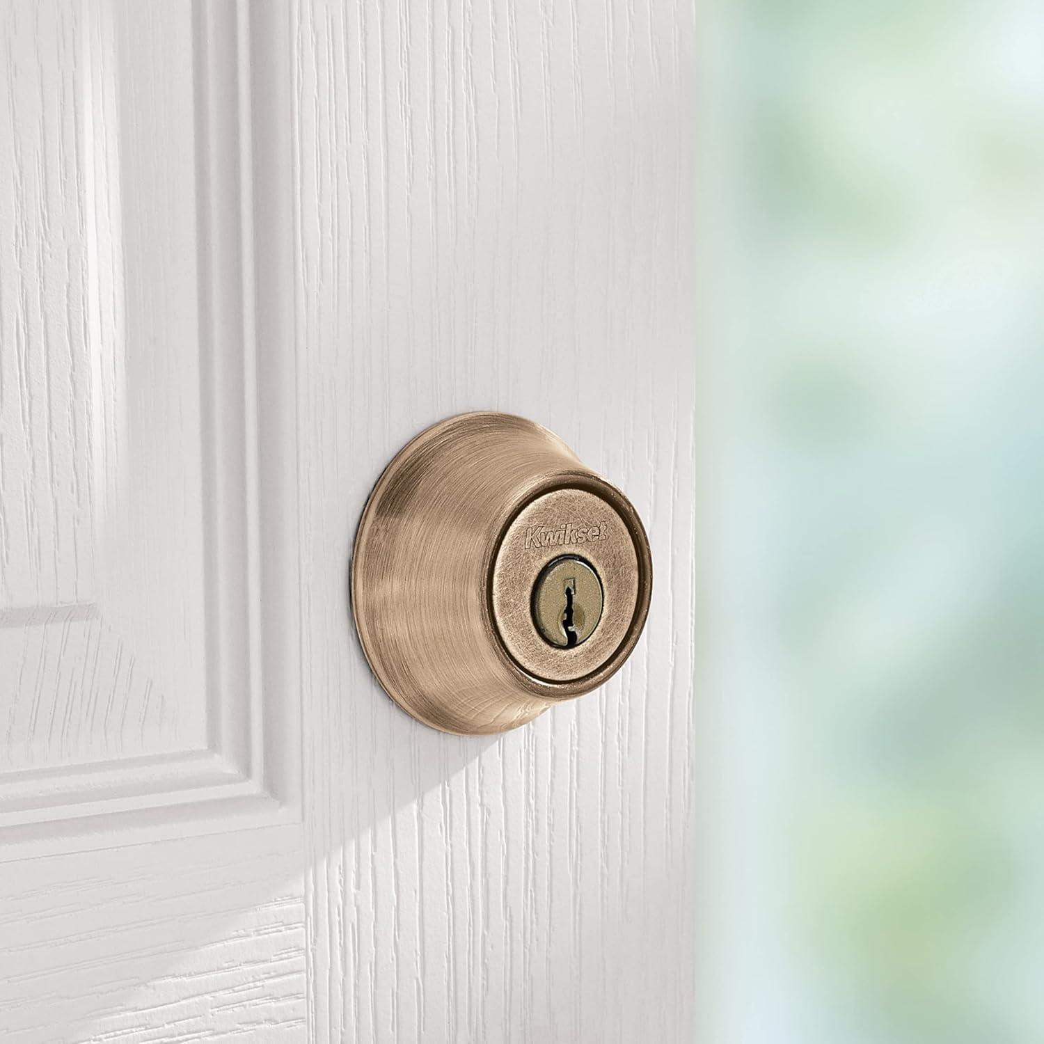 imageKwikset 660 Deadbolt Deadbolt Lock Antique Brass Round Exterior Keyed Front Entry Door Pick Resistant SmartKey Rekey Security Single Cylinder Dead Bolt with Microban ProtectionAntique Brass