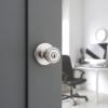 imageKwikset Tylo Entry Door Knob with Lock and Key Secure Keyed Handle Exterior Front Entrance and Bedroom Satin Nickel Pick Resistant SmartKey Rekey Security and Microban