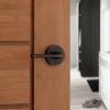 imageKwikset Lisbon Interior Privacy Door Handle with Lock Door Lever For Bathroom and Bedroom Polished Chrome Reversible Keyless Push Button Lock Door LeverVenetian Bronze