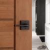 imageKwikset Lisbon Interior Privacy Door Handle with Lock Door Lever For Bathroom and Bedroom Polished Chrome Reversible Keyless Push Button Lock Door LeverVenetian Bronze