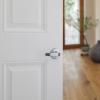 imageKwikset Delta Interior Privacy Door Handle with Lock Door Lever For Bathroom and Bedroom Satin Chrome Reversible Keyless Turn LockSatin Chrome