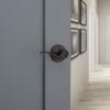imageKwikset Tustin Entry Door Handle with Lock and Key Secure Keyed Reversible Lever Exterior For Front Entrance and Bedrooms Venetian Bronze Pick Resistant Smartkey Rekey Security and Microban