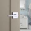 imageKwikset Halifax Vacant Occupied Bathroom Door Handle Lock Privacy Door Lever with Indicator Matte BlackPolished Chrome