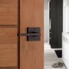 imageKwikset Halifax Vacant Occupied Bathroom Door Handle Lock Privacy Door Lever with Indicator Matte BlackVenetian Bronze